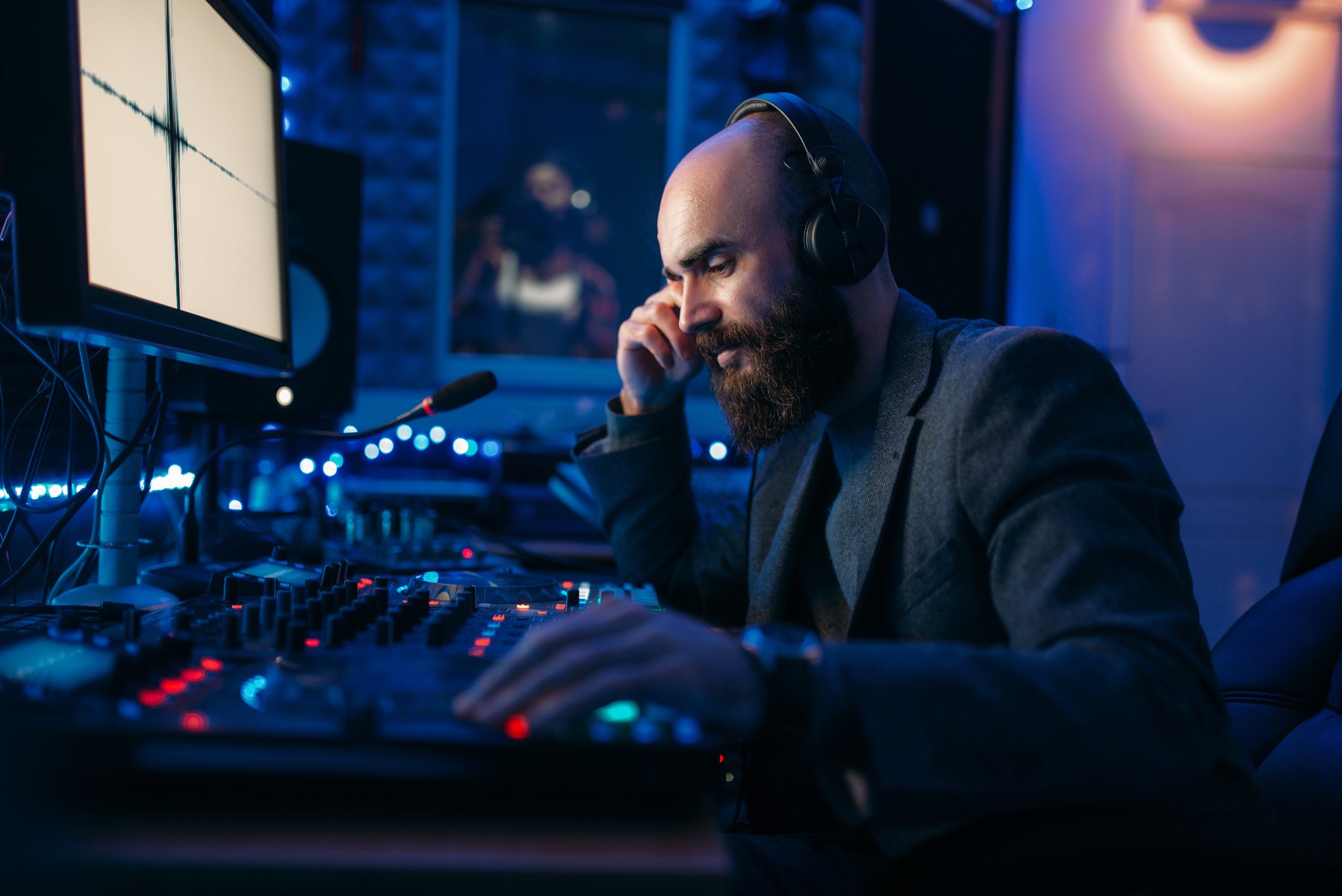 Sound engineer recording mixing desk